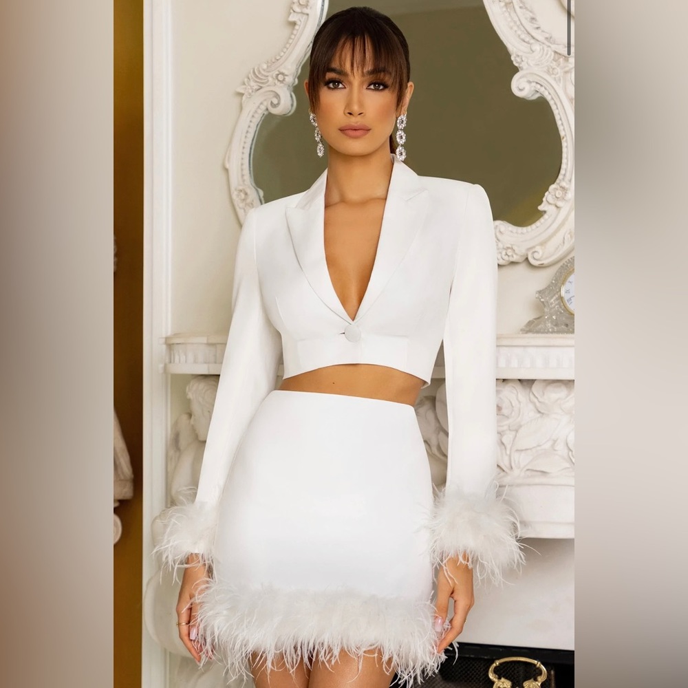 Selling this Club L, two piece set in white, US size 4